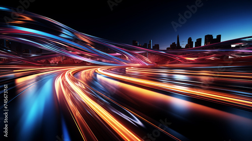 Long exposure captures vibrant light trails through a bustling cityscape during the blue hour.