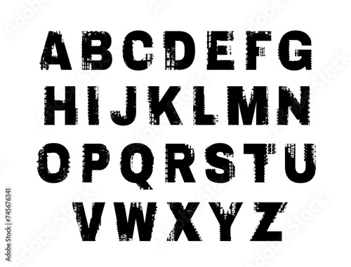 Grunge tire textured letters. Off road lettering in a black color isolated on white background.