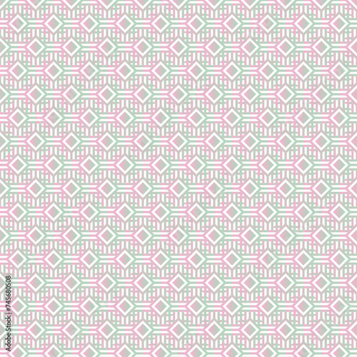 Abstract geometric background with a repeating diamond pattern in pastel pink and green shades, perfect for design and decor.