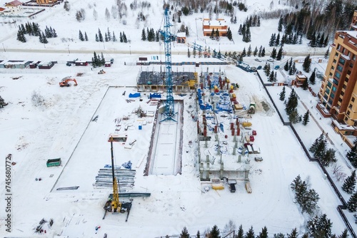 Photography the construction site of an apartment building in the winter from a height