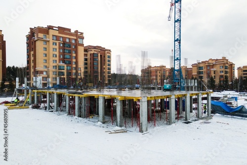 Photography the construction site of an apartment building in the winter from a height