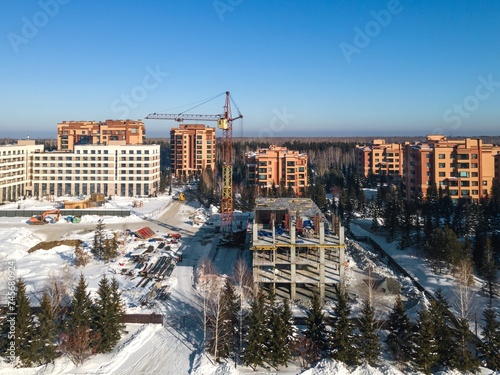Photography the construction site of an apartment building in the winter from a height
