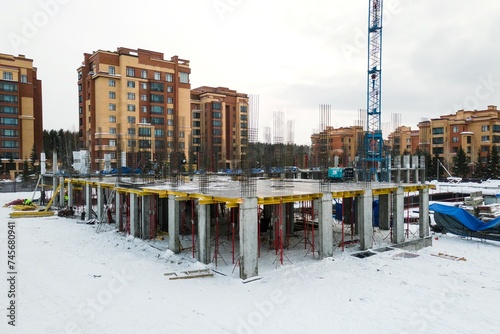 Photography the construction site of an apartment building in the winter from a height
