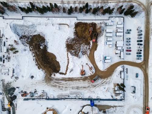 Photography the construction site of an apartment building in the winter from a height