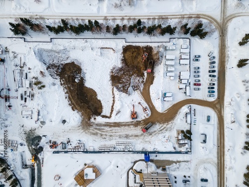 Photography the construction site of an apartment building in the winter from a height