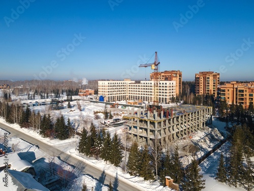Photography the construction site of an apartment building in the winter from a height