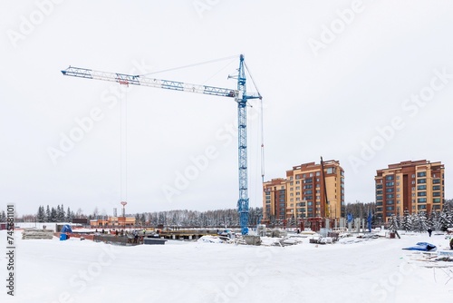 Photography the construction site of an apartment building in the winter from a height