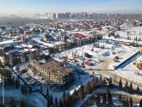 Canvas Print the construction site of an apartment building in the winter from a height