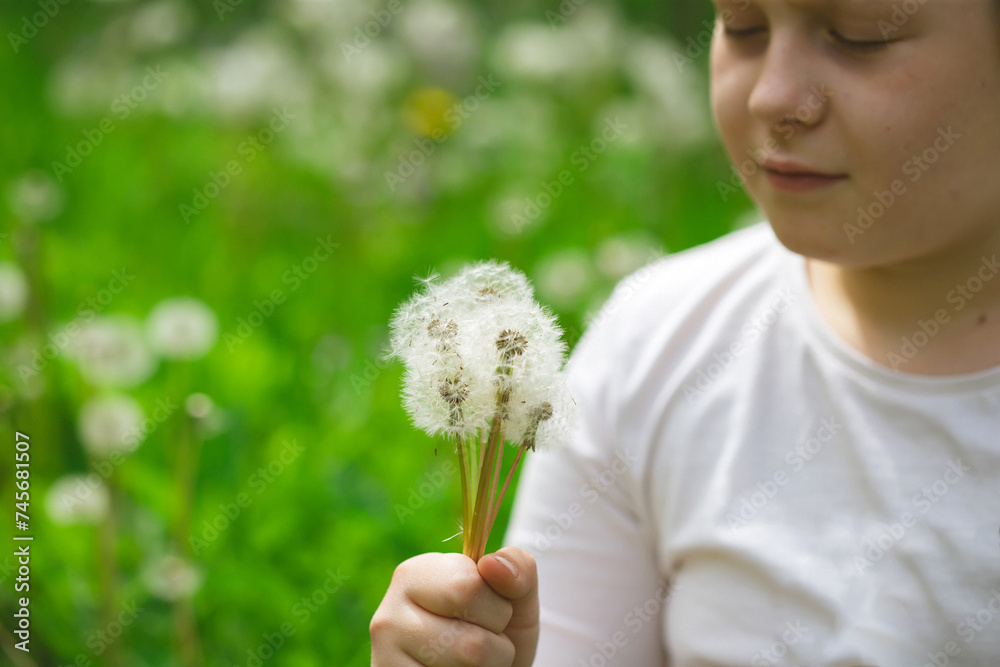 Summer joy - lovely girl blowing dandelion Summer joy - lovely girl blowing dandelion