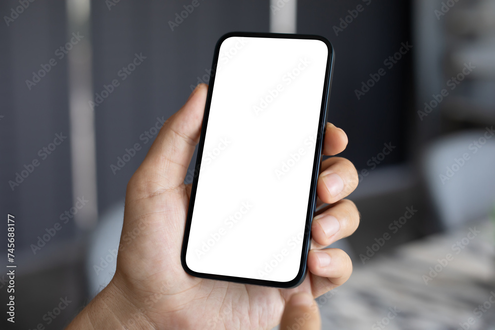 man hand hold phone with isolated screen background of office