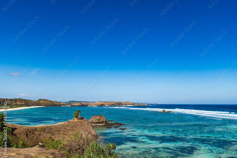 Lombok, Indonesia, Beach ocean view landscape around Seger beach area. Lombok is an island in West Nusa Tenggara province, Indonesia. Lombok, Indonesia, Beach ocean view landscape around Seger beach area. Lombok is an island in West Nusa Tenggara province, Indonesia.