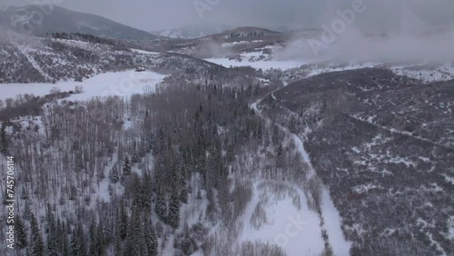 Aspen Snowmass Pitkin county wilderness open space aerial drone cabins in the woods Rocky Mountains Colorado Basalt Carbondale Mt Sopris Maroon Bells Pyramid Peak Ashcroft Independence Pass foggy snow photo