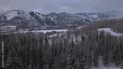 Aspen Snowmass Pitkin county cabin wilderness aerial drone Rocky Mountains Colorado Basalt Carbondale Mt Sopris Maroon Bells Ashcroft Independence Pass foggy snowy morning upward jib motion photo