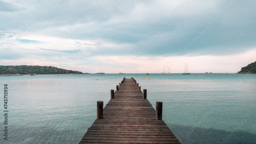 Fototapeta premium A summer at the edge of the Gulf of Santa Giulia, a lagoon south of Porto Vecchio in Corsica, at the beach with turquoise waters