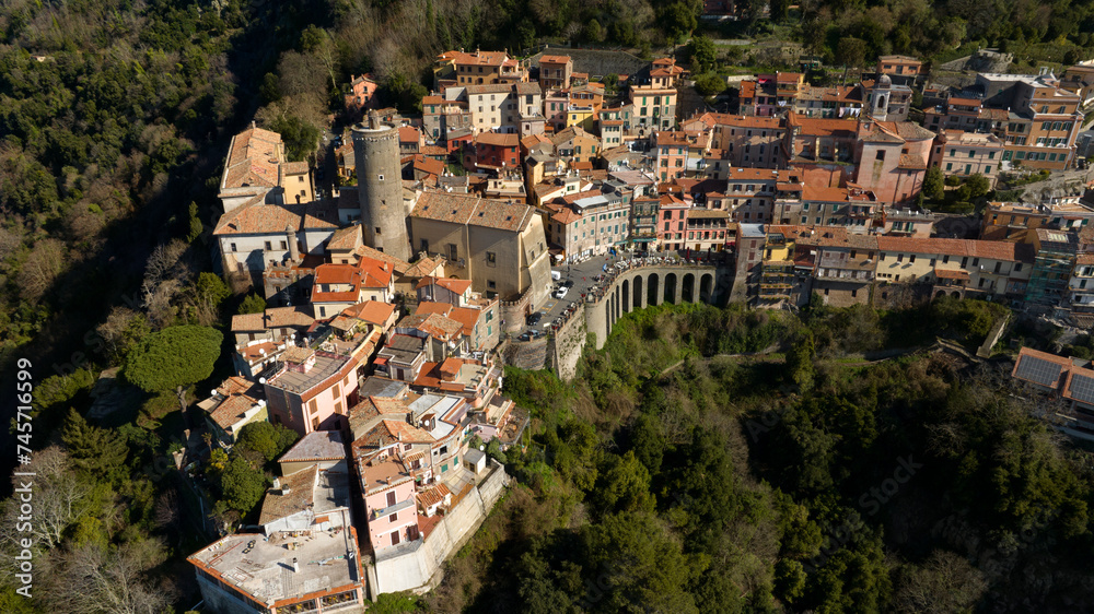 Aerial view of Nemi, a town and comune in the Metropolitan City of Rome, Italy. It is located in the Alban Hills. The historic center is included in the Castelli Romani regional park.