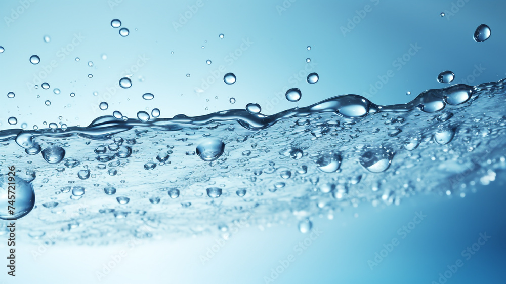 water splashes and drops on light blue background water splashes and drops on light blue background