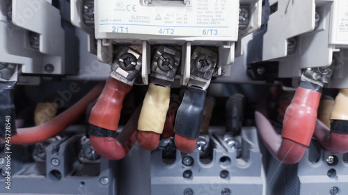 Three pashe Wiring on the Terminal cable connection power with connector cable bolt tightening.
 photo
