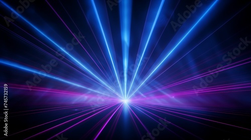 Blue and violet beams of bright laser light shining on black background © Elchin Abilov