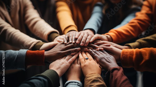 Diverse hands joined in solidarity and teamwork. Generative AI.