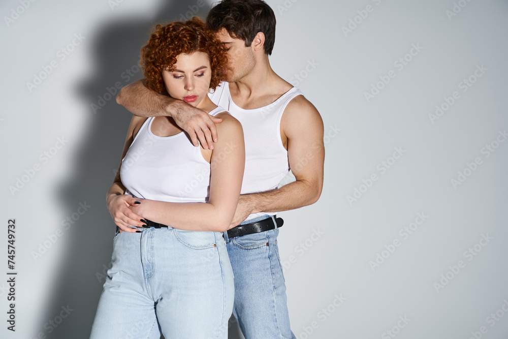 appealing loving man and woman in casual attires hugging before kissing passionately, sexy couple appealing loving man and woman in casual attires hugging before kissing passionately, sexy couple