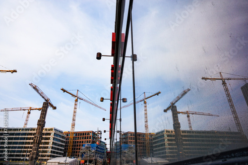 Reflection of a construction site in a window
