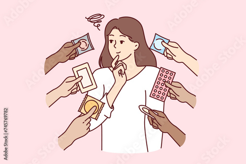 Woman chooses method of contraception from birth control pills and condoms for safe sex. Thoughtful girl cares about health consciously approaches choice of contraception to avoid unplanned pregnancy