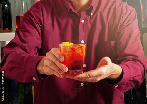 Bartender serving a classic cocktail