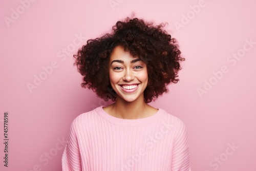 Smiling Woman in Pink Sweater