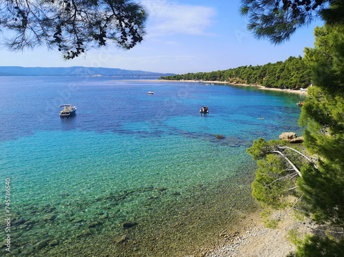 A pebble beach in Bol, Crotia on the island of Brac. Lovely sunlight