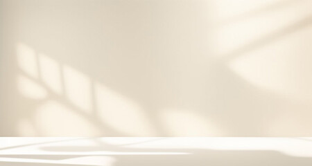 Minimalistic abstract simple gentle light beige background for product presentation with light and beautiful shadow from window on wall.