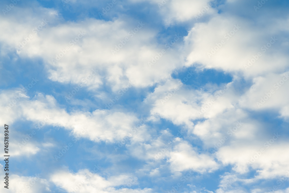 Blue sky background with tiny clouds. Nature abstract background for your design Blue sky background with tiny clouds. Nature abstract background for your design