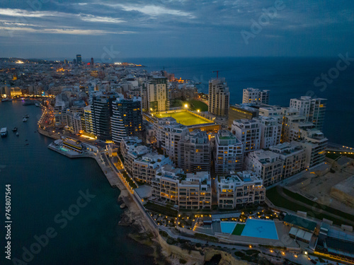 Drone aerial evening view of apartment building in Sliema  Malta