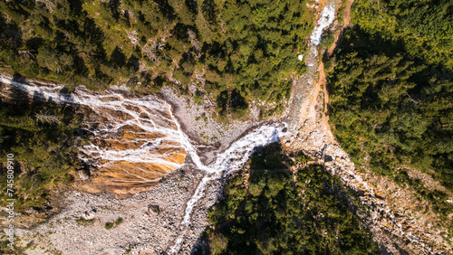 Aerial photo by drone of the Rosière lake and the forest in Courchevel in the Tarentaise valley in France photo