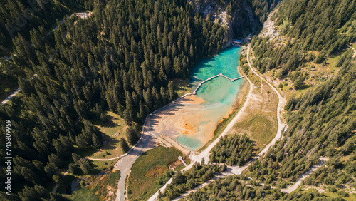 Aerial photo by drone of the Rosière lake and the forest in Courchevel in the Tarentaise valley in France photo