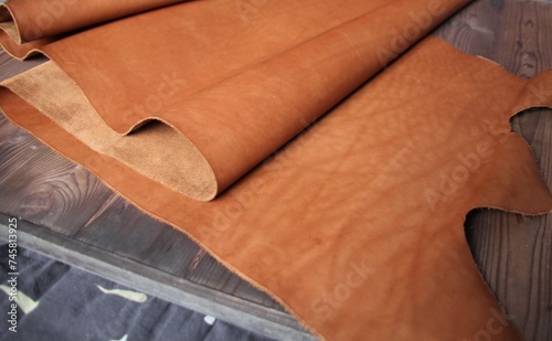 Natural leather texture surface of cognac color