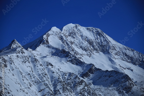 snowcaped mountains in canton valais in the swiss alps © Marcel