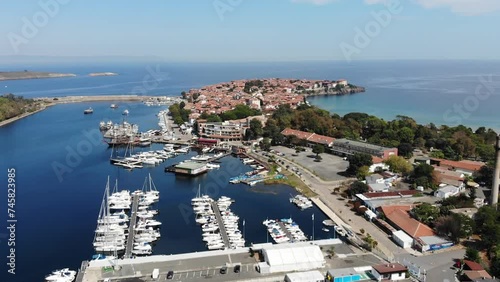 Sozopol, Bulgaria. Aerial harbor view of marina and old city. Drone view from above. Summer holidays destination. photo