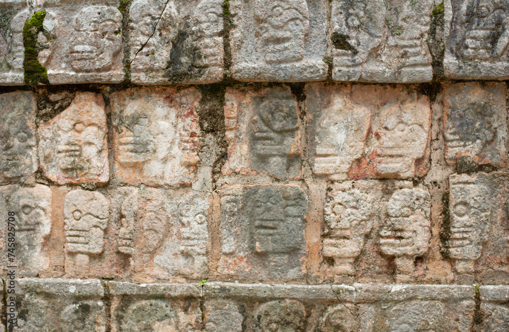 hieroglyphic inscriptions carved on the walls of the religion building in Chichen-Itza