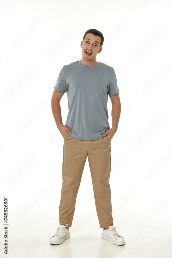 surprised guy looking at camera on white studio background surprised guy looking at camera on white studio background