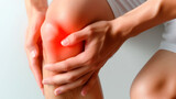 Person holding knee in pain with highlighted area, concept of joint pain and healthcare.