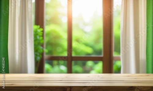 Empty of wood table top on blur of curtain with window view green from tree garden background.For montage product display or design key visual layout © Muh Saleh