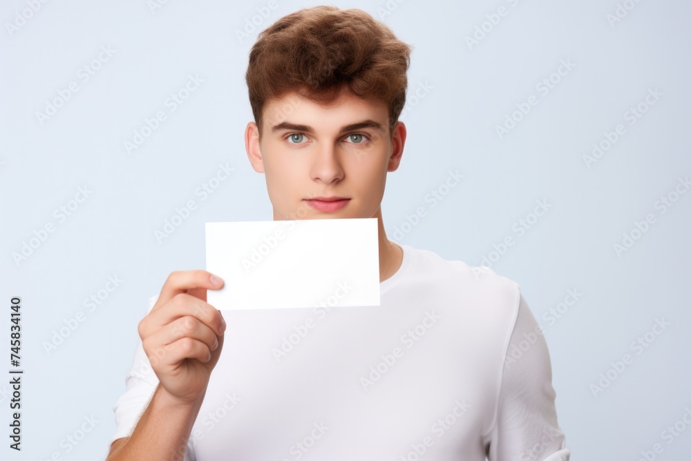 person holding an empty visit card person holding an empty visit card