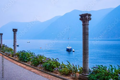 The lakeside path in Park Villa Heleneum, Lugano, Switzerland photo