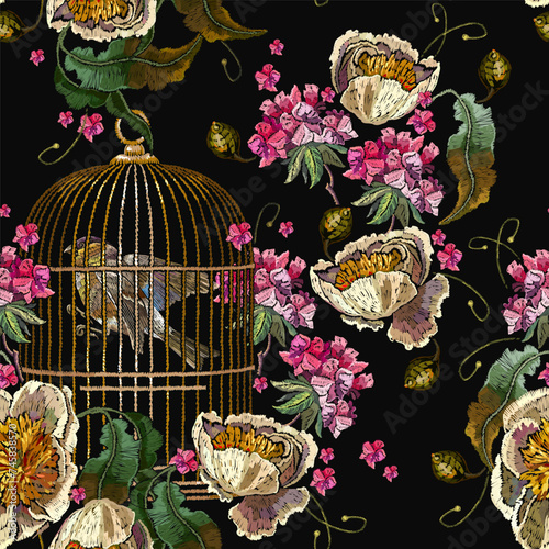 Caged birds, yellow peonies and geranium flowers. Fashion embroidery seamless pattern. Template for clothes, textiles, t-shirt design