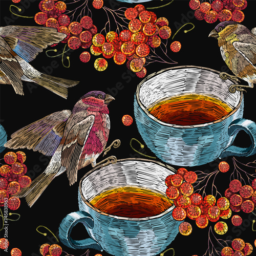 Autumn seamless pattern. Embroidery cup of tea, birds and mountain ash berries. Fall garden template of clothes, tapestry, t-shirt design