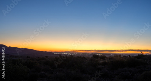 Blue hour Sunrise sky over the Karoo National Park with Beaufort West in the background, Karoo, Western Cape, South Africa