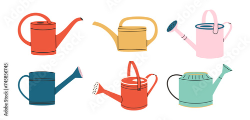 Set of watering cans for gardening. Hand drawn vector illustration. photo