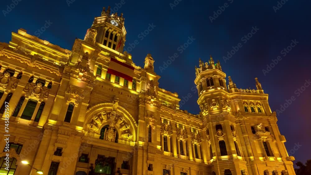 custom made wallpaper toronto digitalMADRID, SPAIN - FEBRUARY 19, 2024: Timelapse hyperlapse view of Cibeles palace and square, famous touristic landmark. Fountain on the square and traffic circle around.