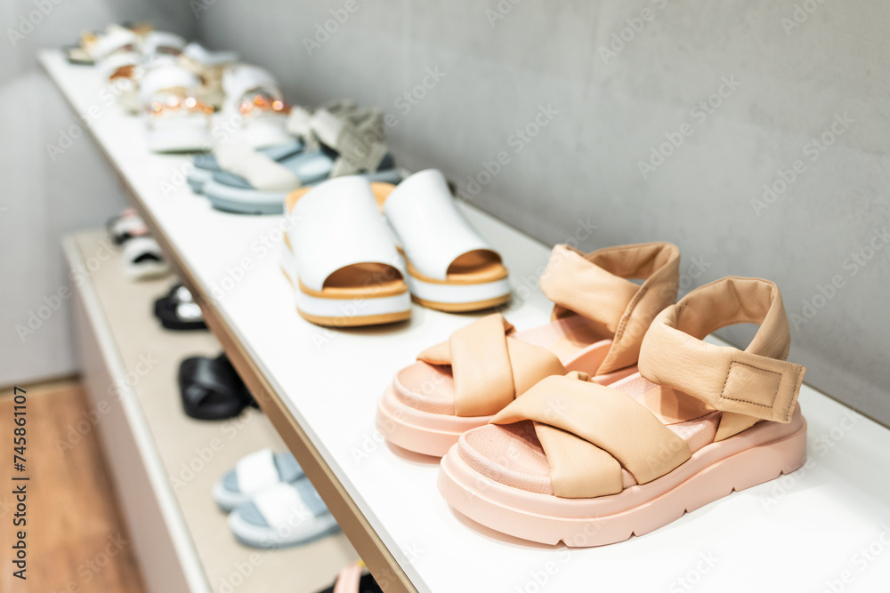 Women's summer shoes on the store shelf. Women's summer shoes on the store shelf.