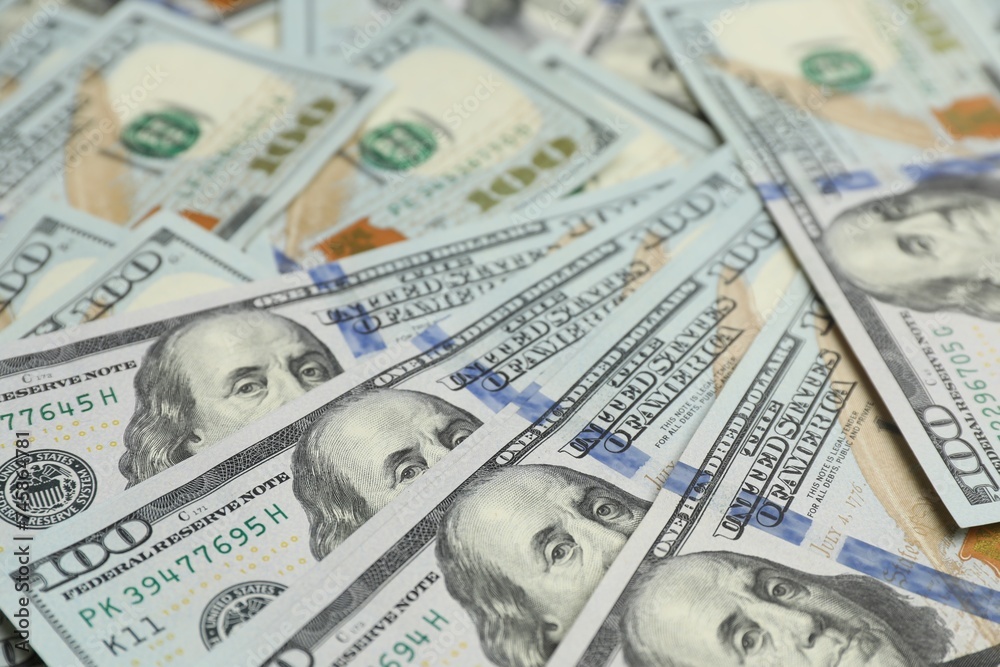 Money exchange. Dollar banknotes as background, closeup Money exchange. Dollar banknotes as background, closeup